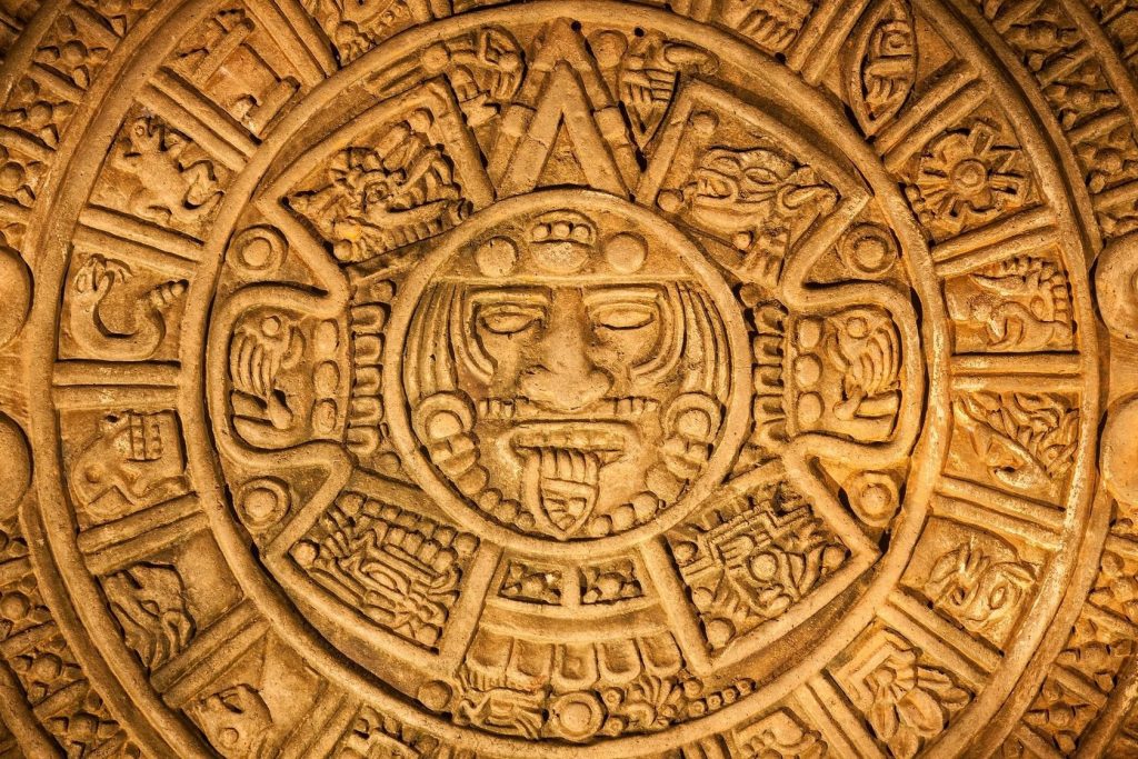 The Mayan calendar and symbol.